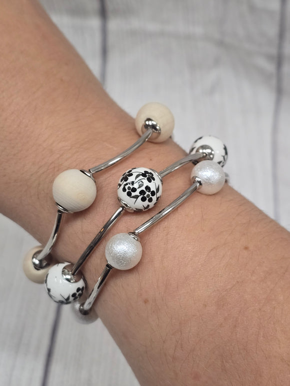 3 piece stretchy bracelet with white floral beads