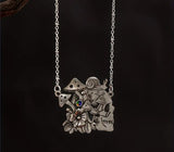 mushroom and skull necklace