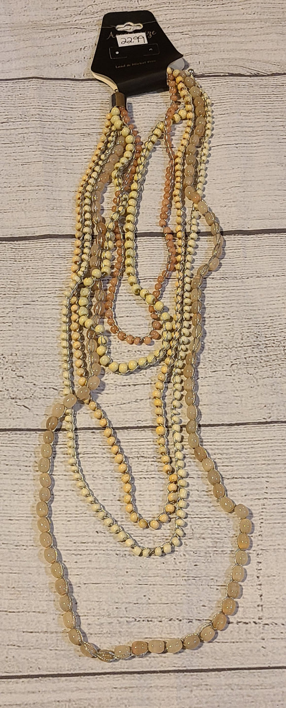 5 strand light peach necklace