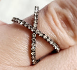 black criss cross ring